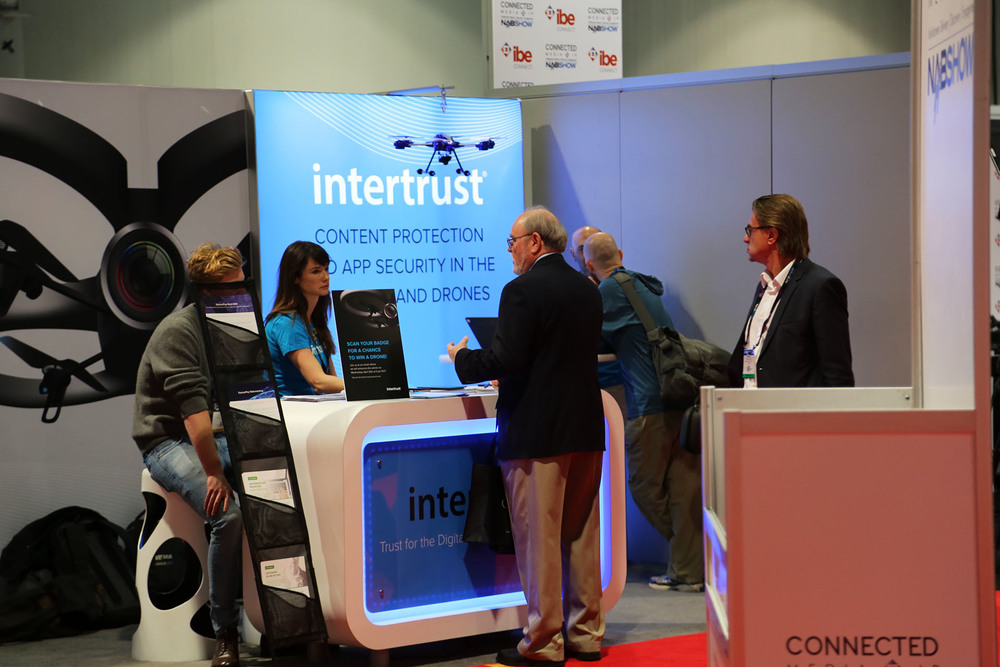 Intertrust employees inform visitors about the company’s digital entertainment ecosystem solutions.